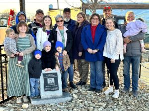 Jeff Peal family with monument