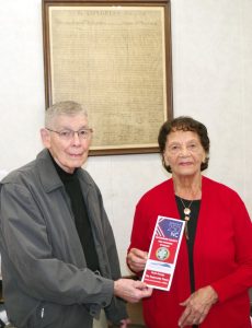 America 250 - Lee Sharpe and Rebecca Dula stand in front of the Declaration of Independence